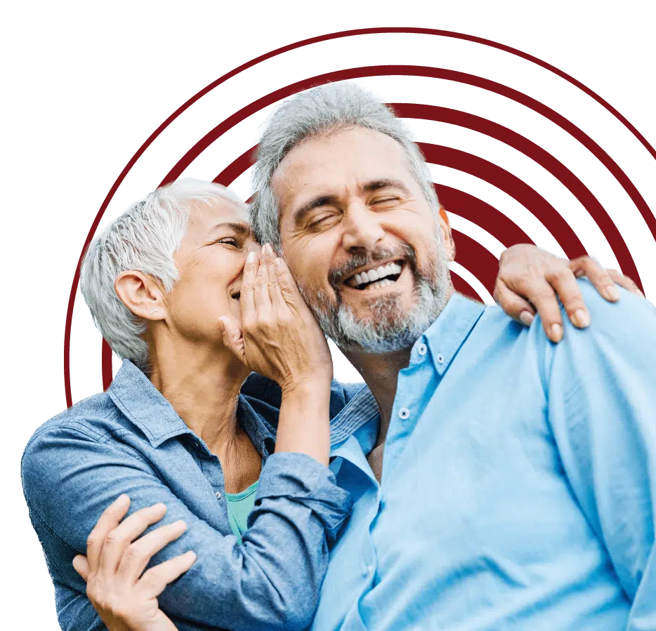 woman whispering in a mans ear