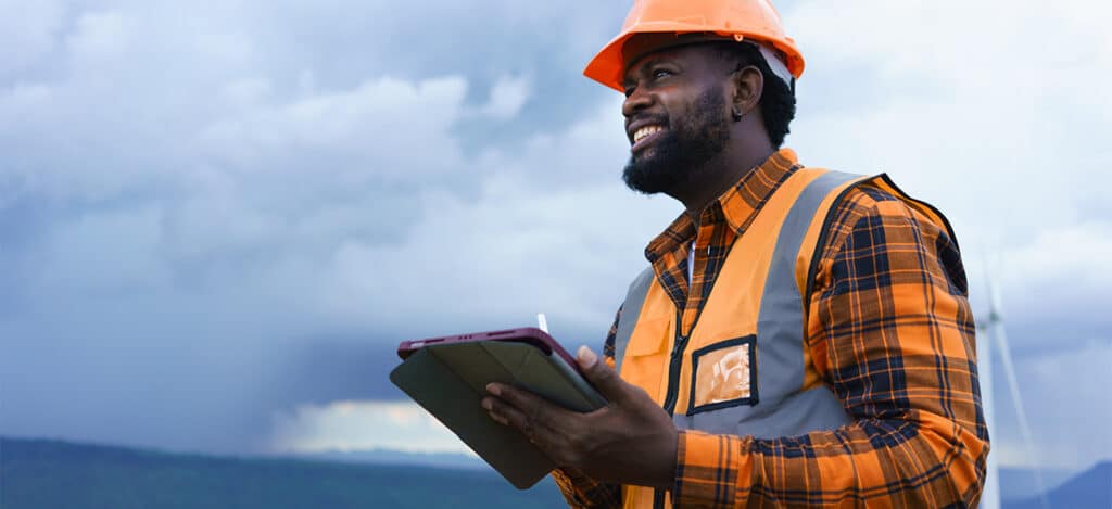 Engineer wearing hearing protection outdoors to protect his hearing while working