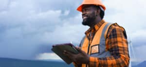 Engineer wearing hearing protection outdoors to protect his hearing while working